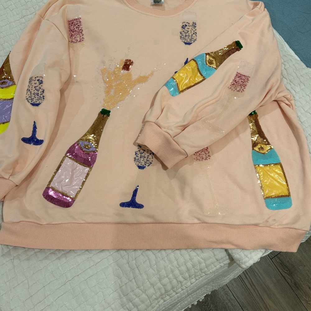 Queen of Sparkles
Sequin Champagne Celebration Sweatshirt